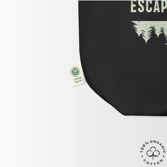 Zoom black tote black with 'Escape to Wilderness' design and organic cotton certification logos on a white background