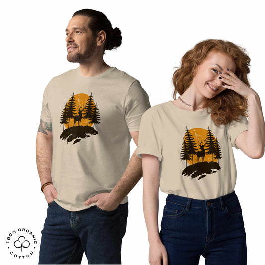 happy man and woman outdoorsy wearing dust t-shirts with a nature-themed design featuring trees and a deer.
