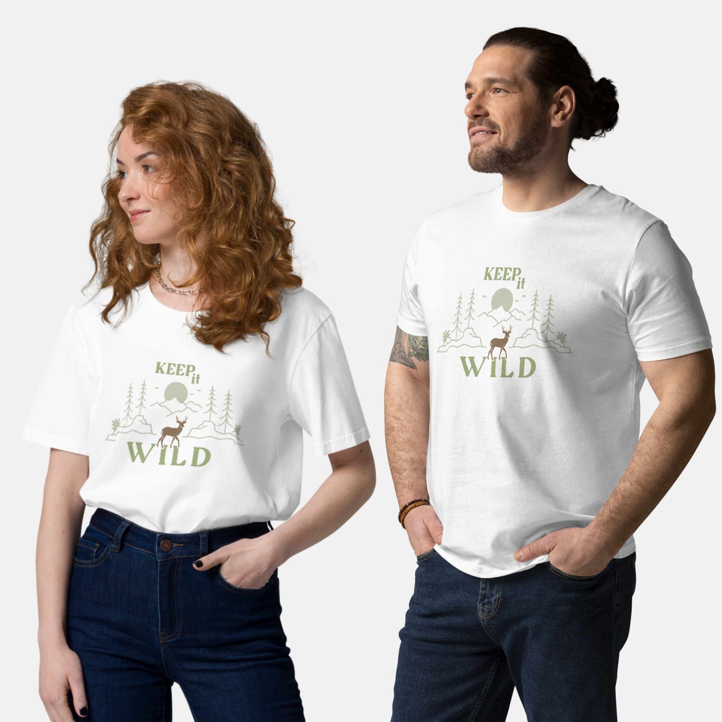 man and woman wearing white organic t-shirt with 'Keep it Wild' bold and deer, mountain, forest graphic design