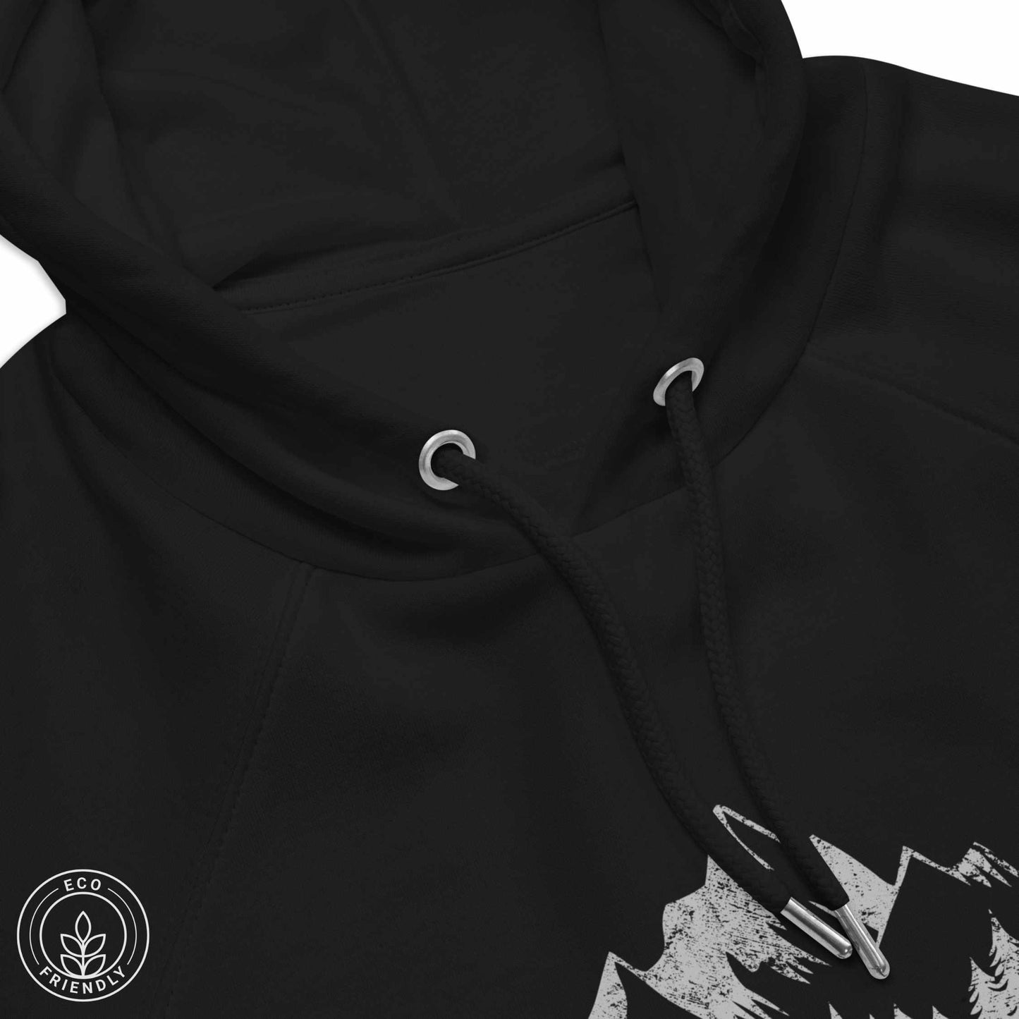 CLose-up Black eco friendly hoodie featuring forest, mountain and compass design and 'Escape to wilderness' graphic text on a white background