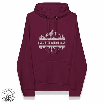 Burgundy eco friendly hoodie featuring forest, mountain and compass design and 'Escape to Wilderness' graphic text on a white background