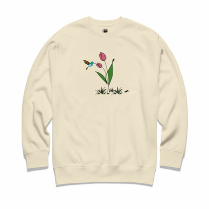Bone sweatshirt with a floral design featuring tulips and hummingbird against a white background