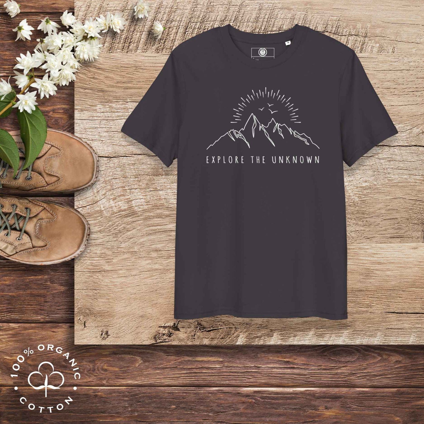 Eco-friendly -shirt with  with mountain design and 'Explore the Unknown' text.