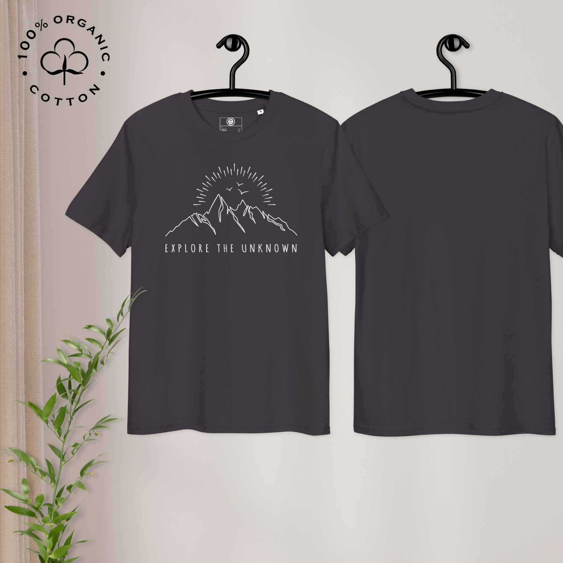 Eco-friendly -shirt with  with mountain design and 'Explore the Unknown' text.