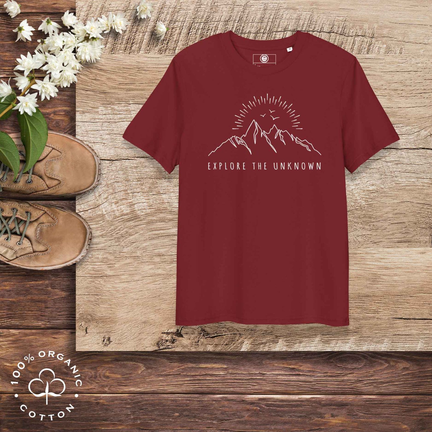 Eco-friendly -shirt with  with mountain design and 'Explore the Unknown' text.