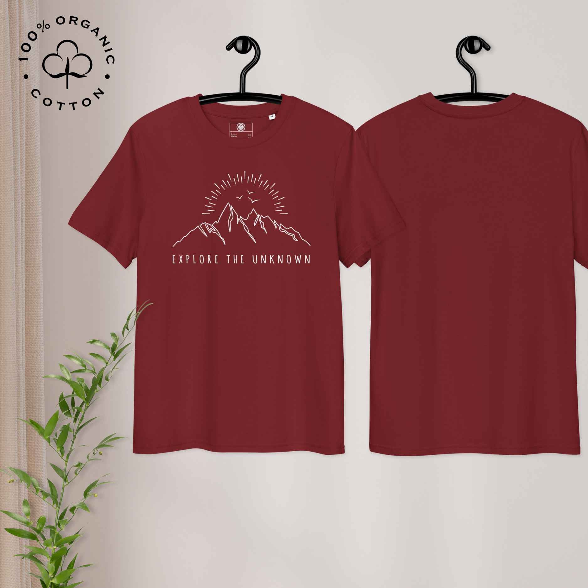 Eco-friendly -shirt with  with mountain design and 'Explore the Unknown' text.