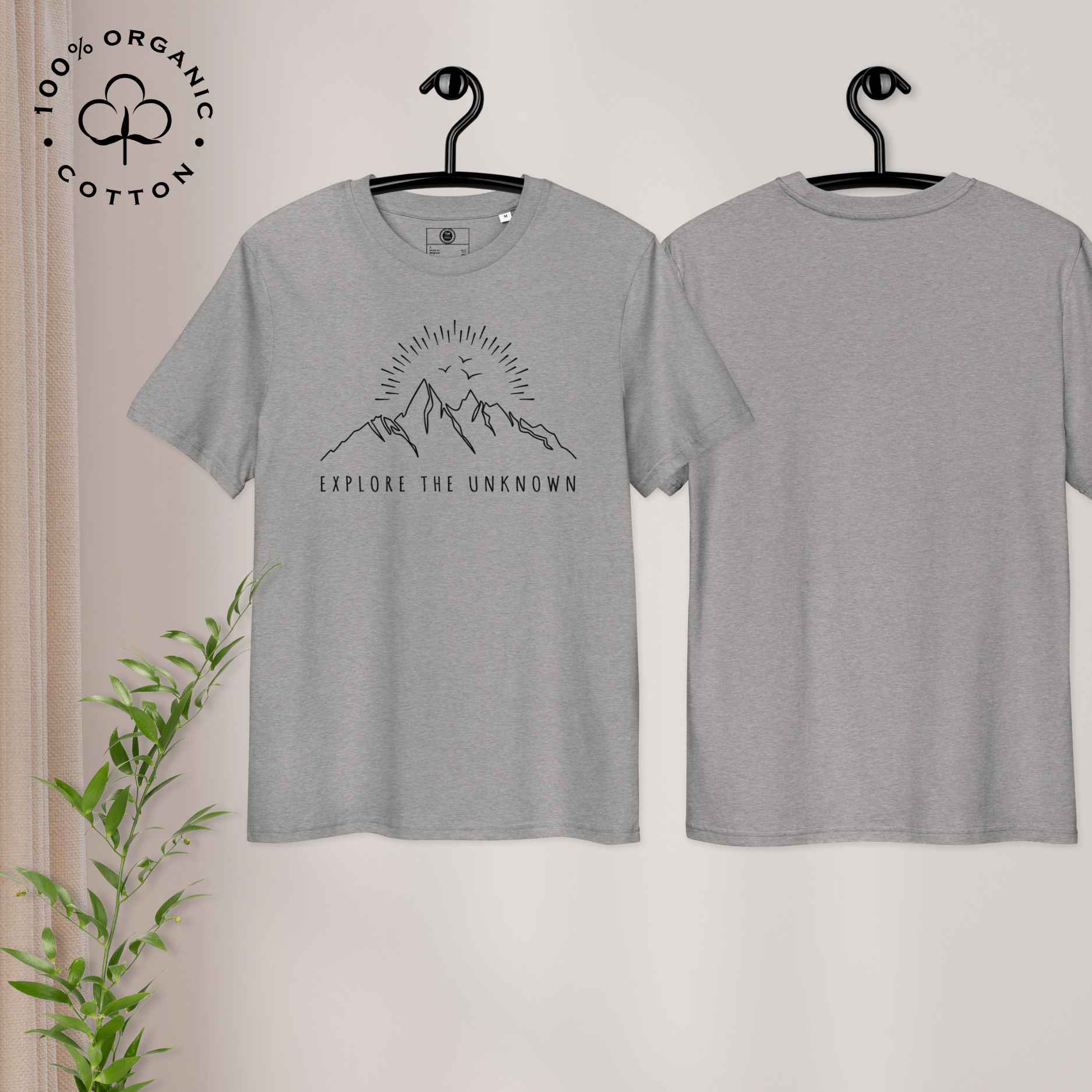 Eco-friendly -shirt with  with mountain design and 'Explore the Unknown' text.