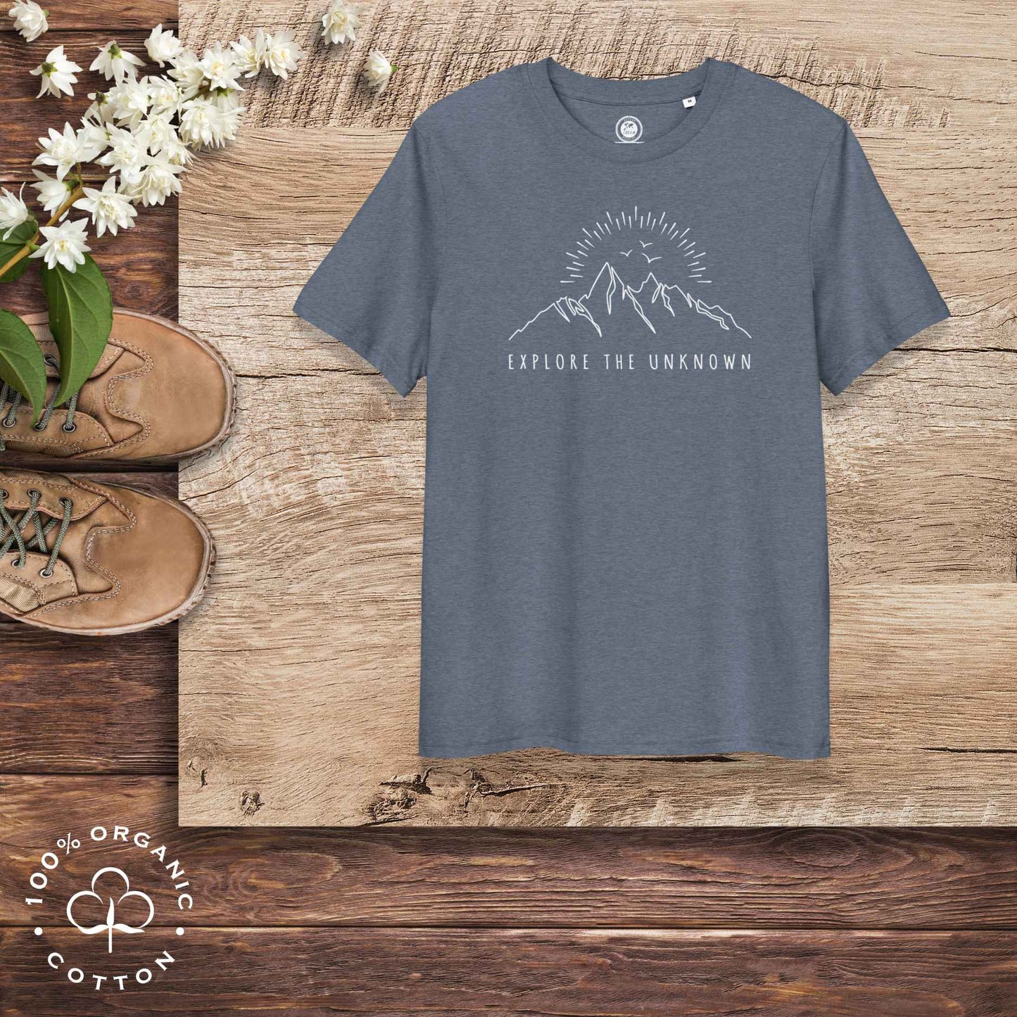 Eco-friendly -shirt with  with mountain design and 'Explore the Unknown' text.