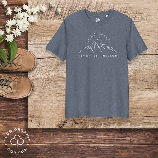 Eco-friendly -shirt with  with mountain design and 'Explore the Unknown' text.