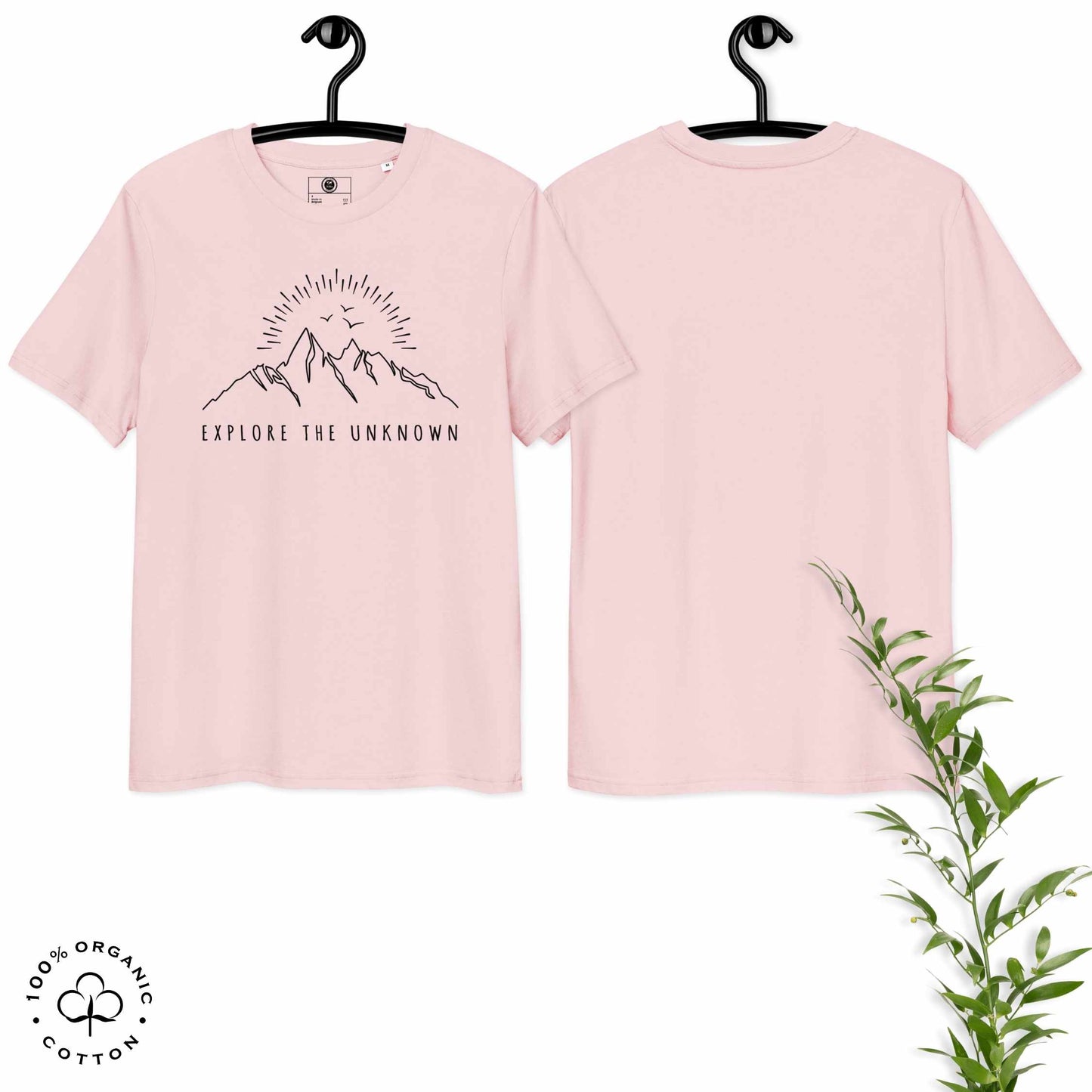 Pink organic cotton t-shirt with mountain, sun and birds graphic and 'Explore the Unknown' text hanged  on a white background