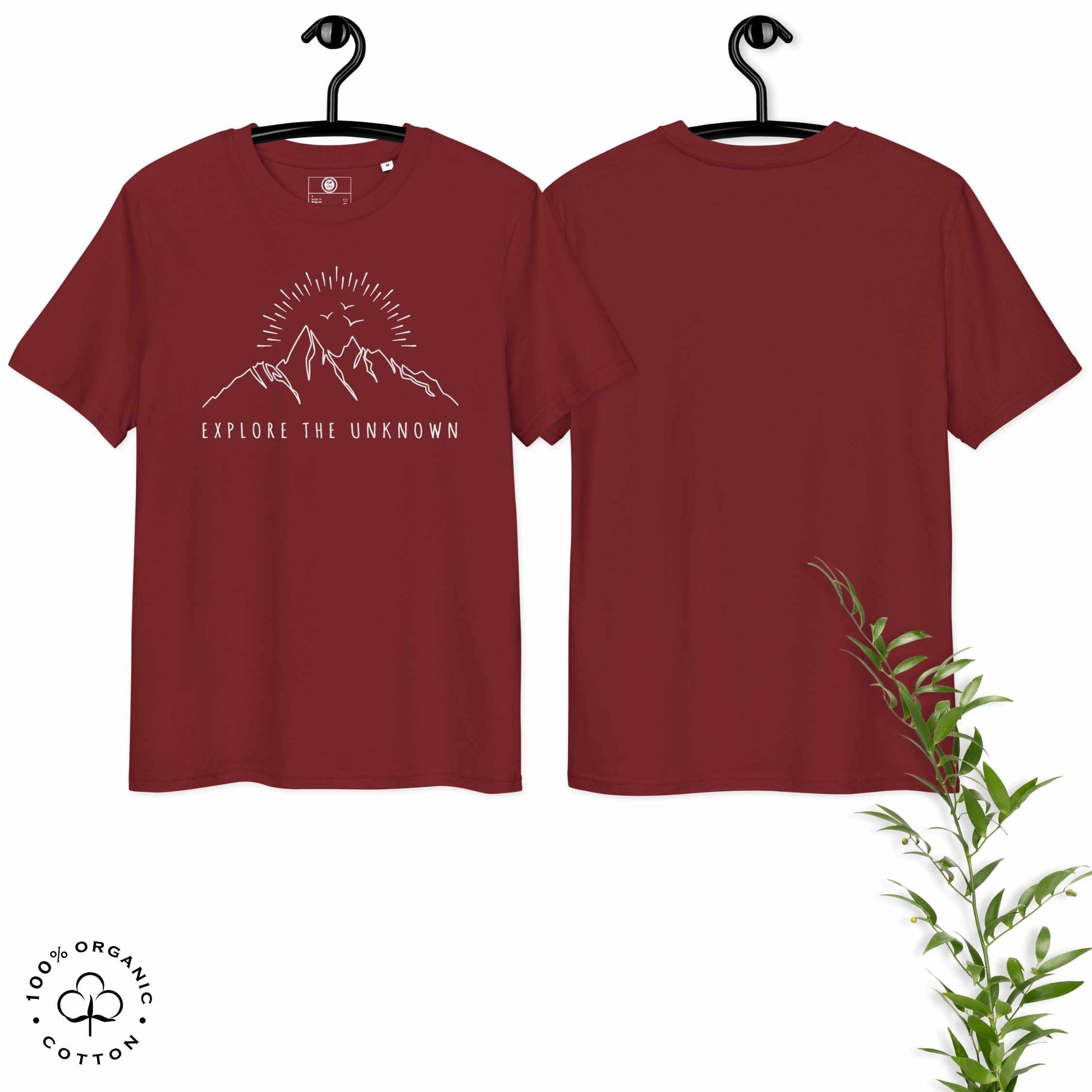 Hanged burgundy organic cotton t-shirt with mountain, sun and birds graphic and 'Explore the Unknown' text  on a white background