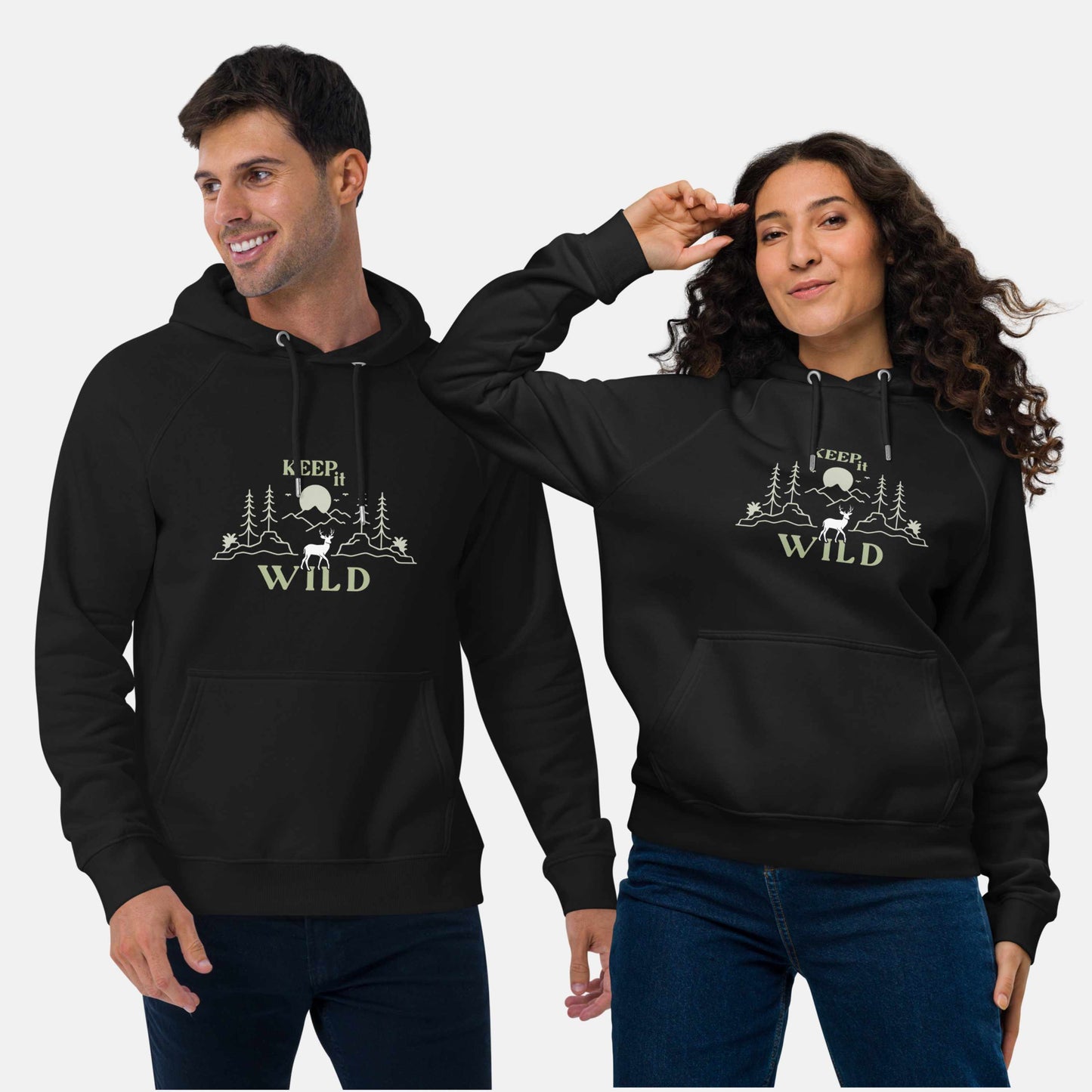 Man and woman wearing black eco hoodie with 'Keep it Wild' bold and deer, mountain, forest graphic design
