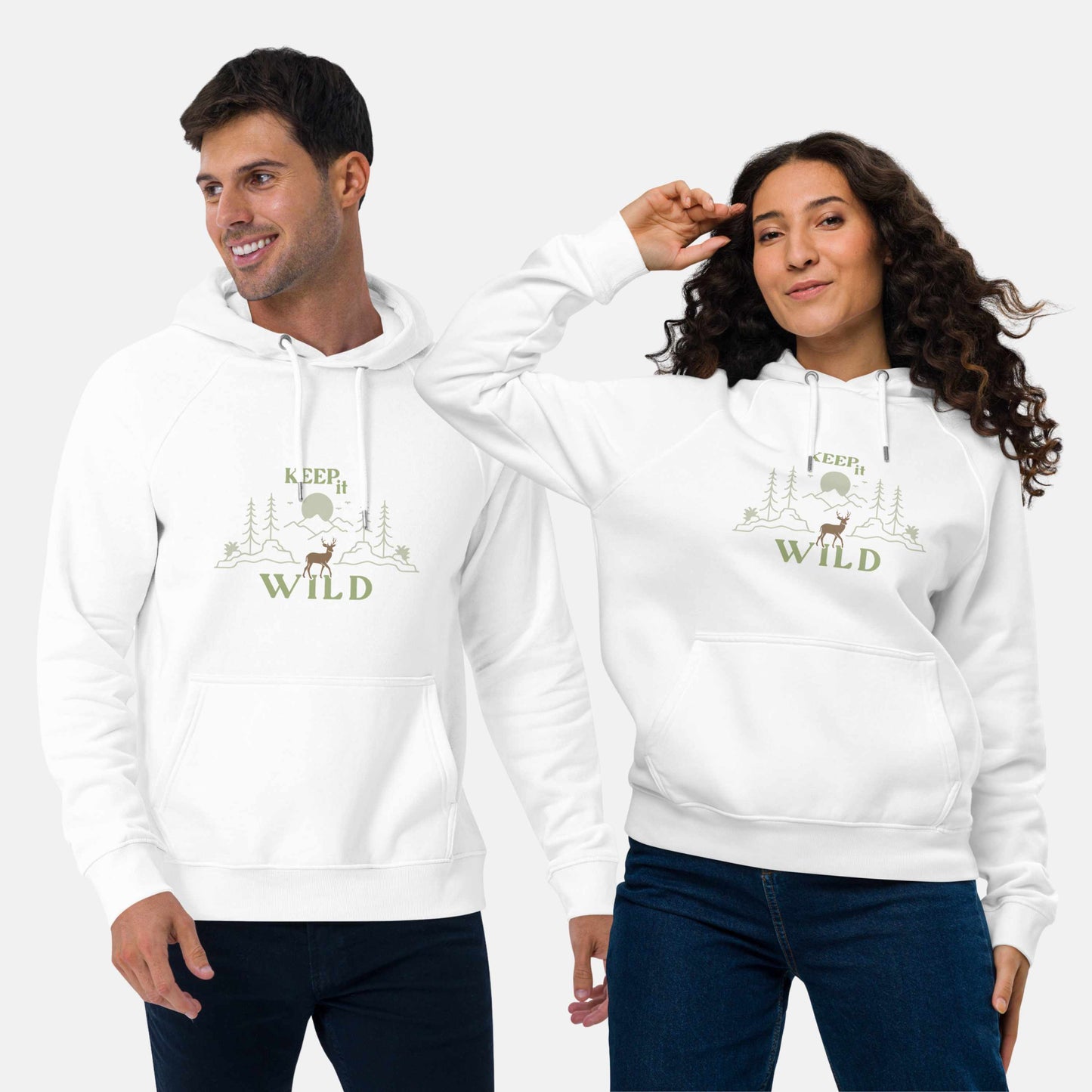 Man and woman wearing white eco hoodie with 'Keep it Wild' bold and deer, mountain, forest graphic design