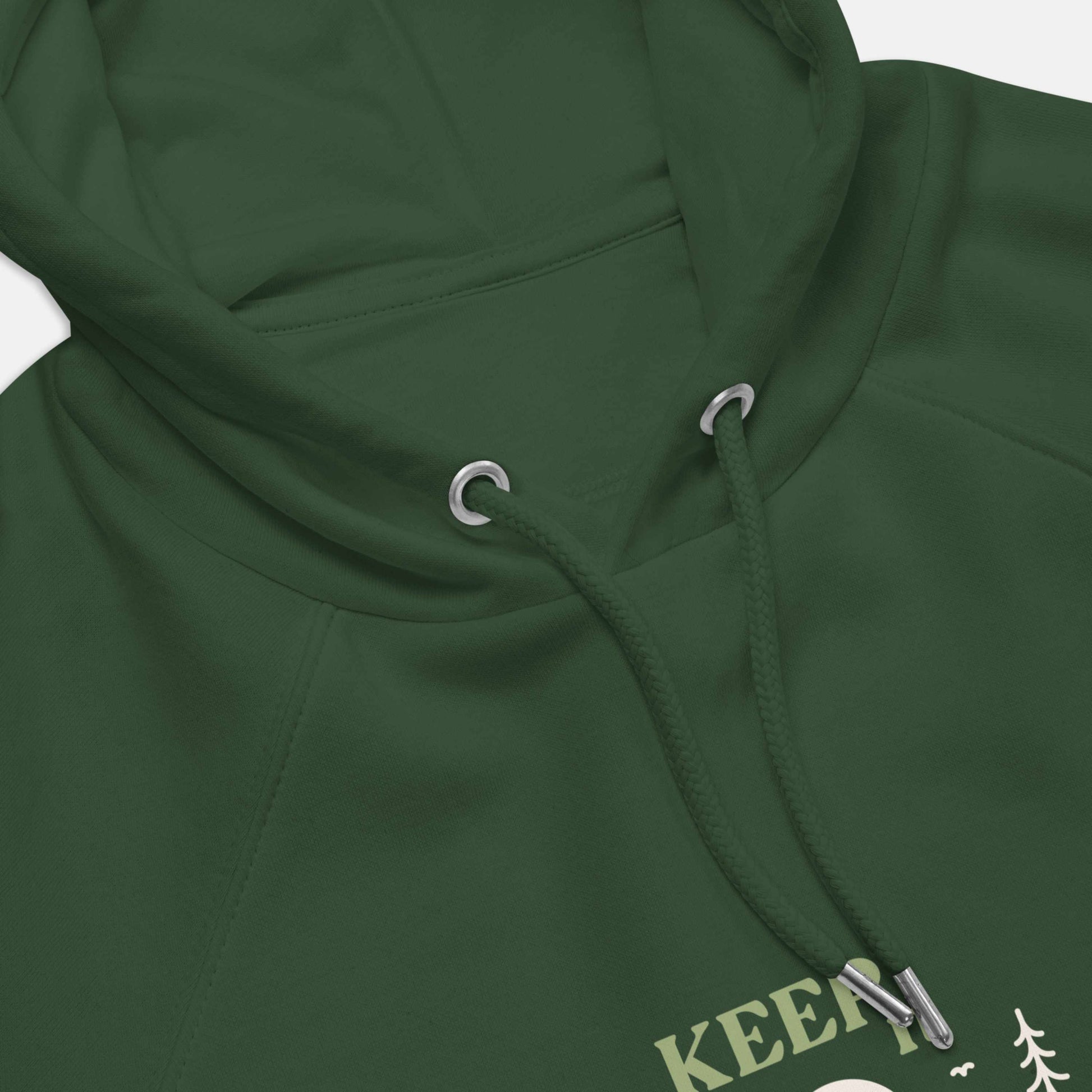 green eco hoodie with 'Keep it Wild' bold and deer, mountain, forest graphic design