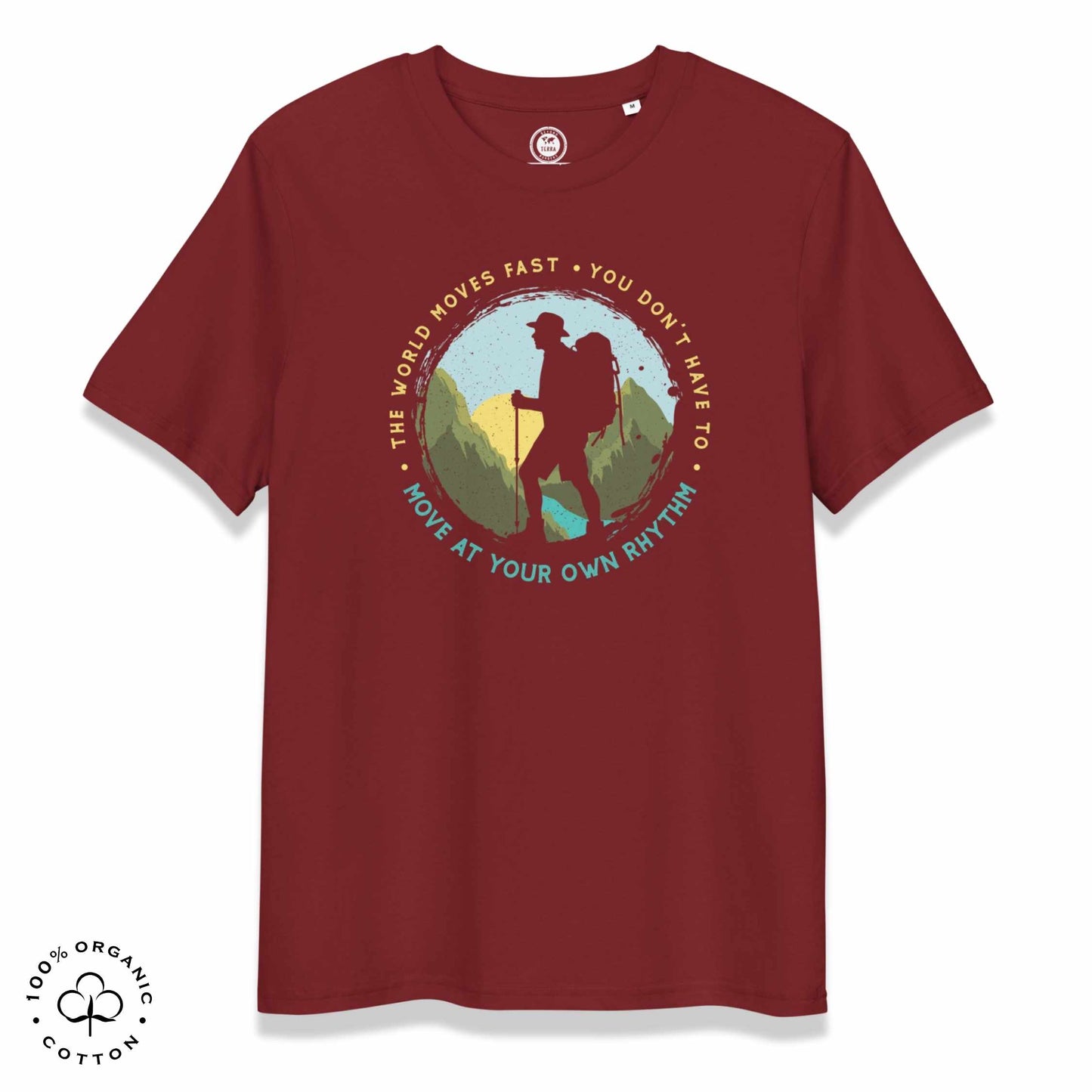 Maroon organic cotton t-shirt with a hiking graphic design and text "Move at your own rhythm" on a white background