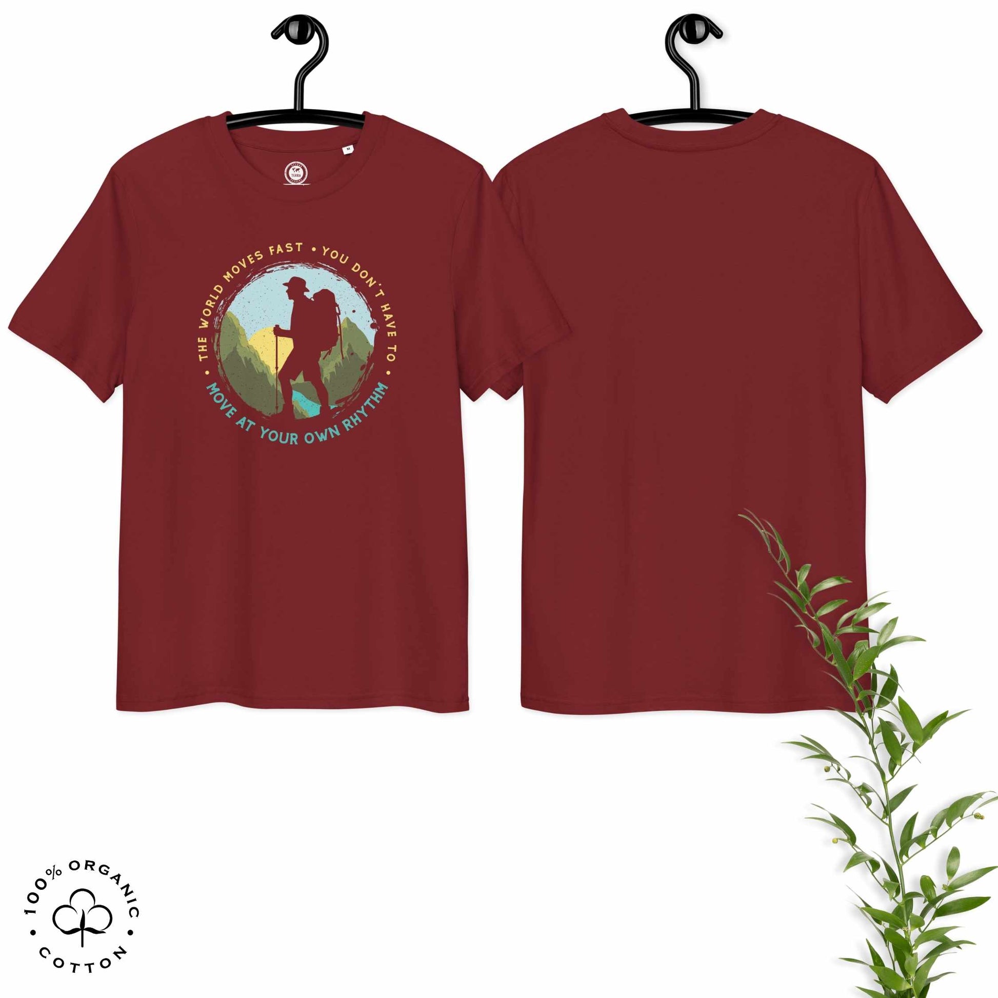 Maroon organic cotton t-shirt with a hiking graphic design and text "Move at your own rhythm" on a white background