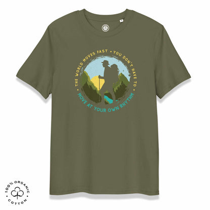 Khaki organic cotton t-shirt with a hiking graphic design and text "Move at your own rhythm" on a white background