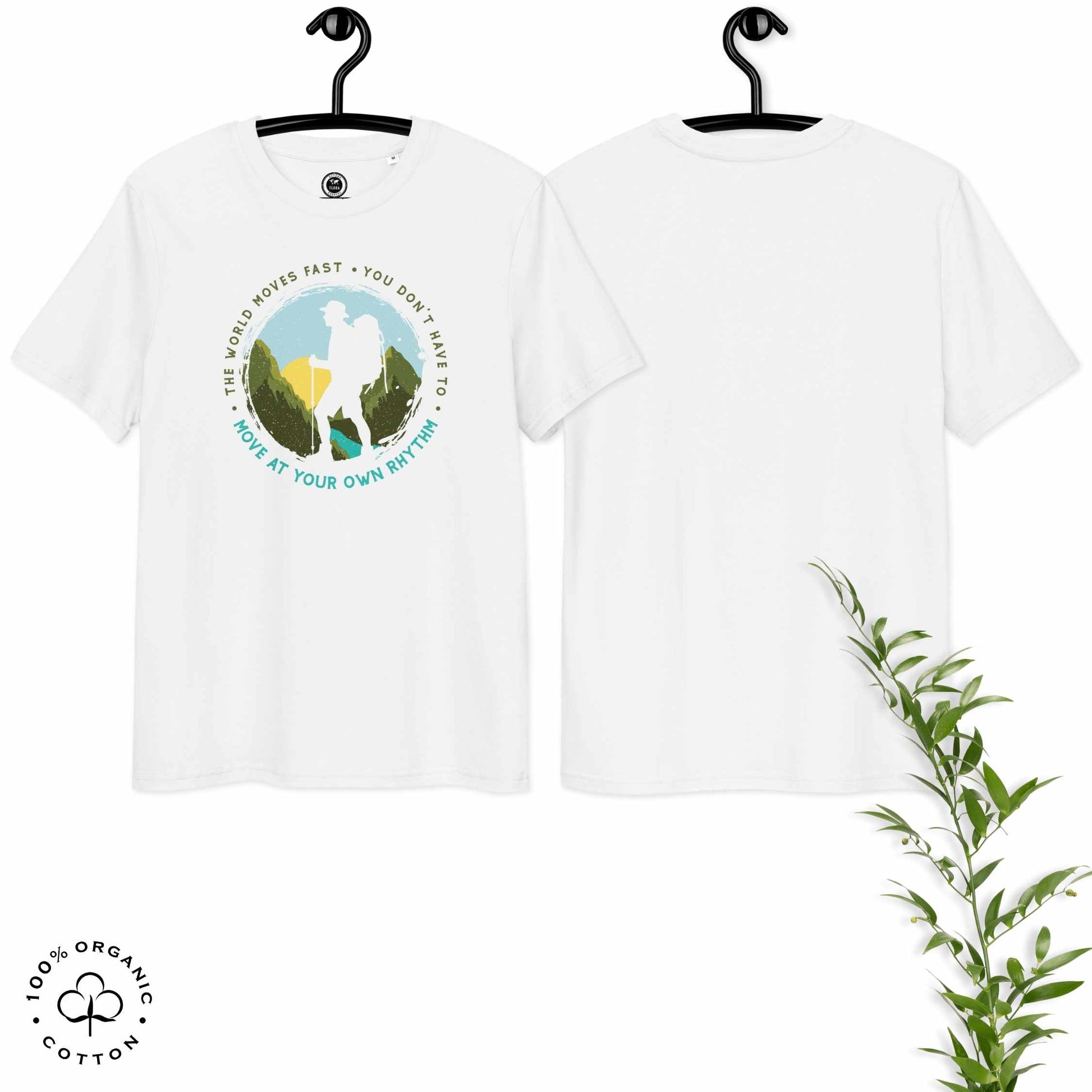 White organic cotton t-shirt with a hiking graphic design and text "Move at your own rhythm" on a white background