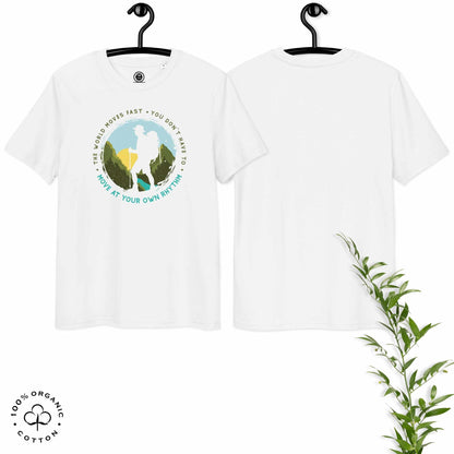 White organic cotton t-shirt with a hiking graphic design and text "Move at your own rhythm" on a white background