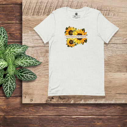 Woman Sunflower t-shirt. Slogan Powered by Sunshine.