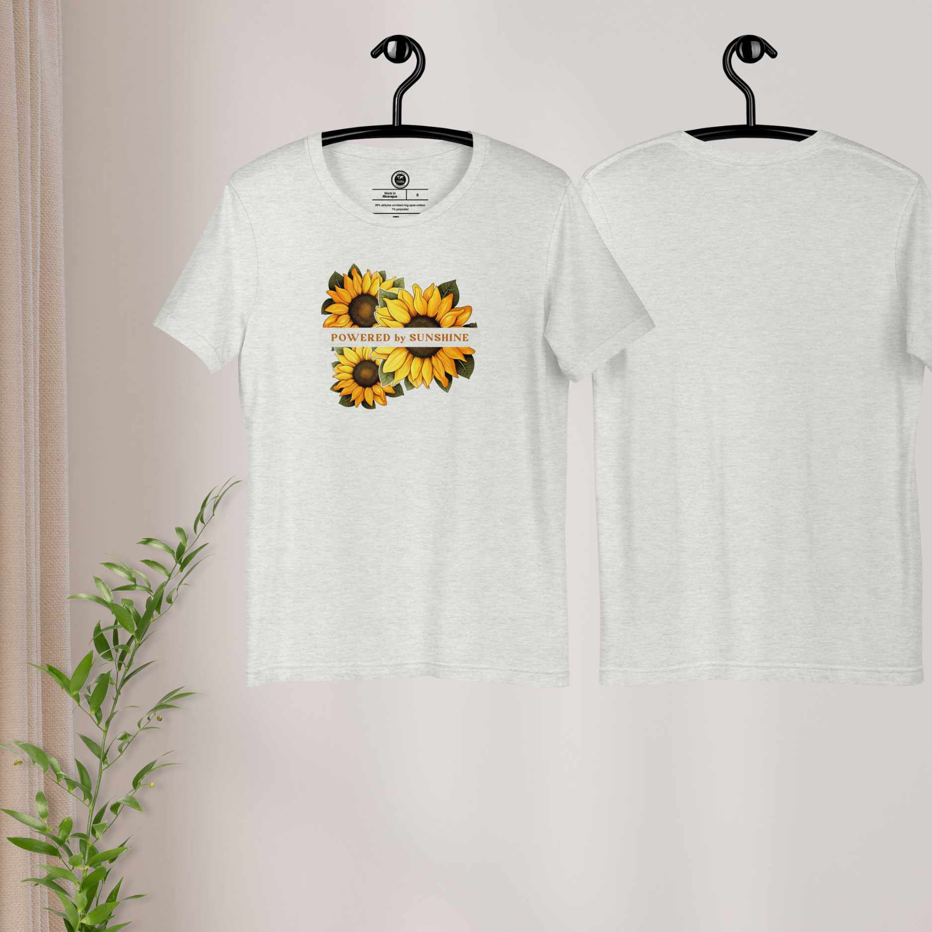 Woman Sunflower t-shirt. Slogan Powered by Sunshine.