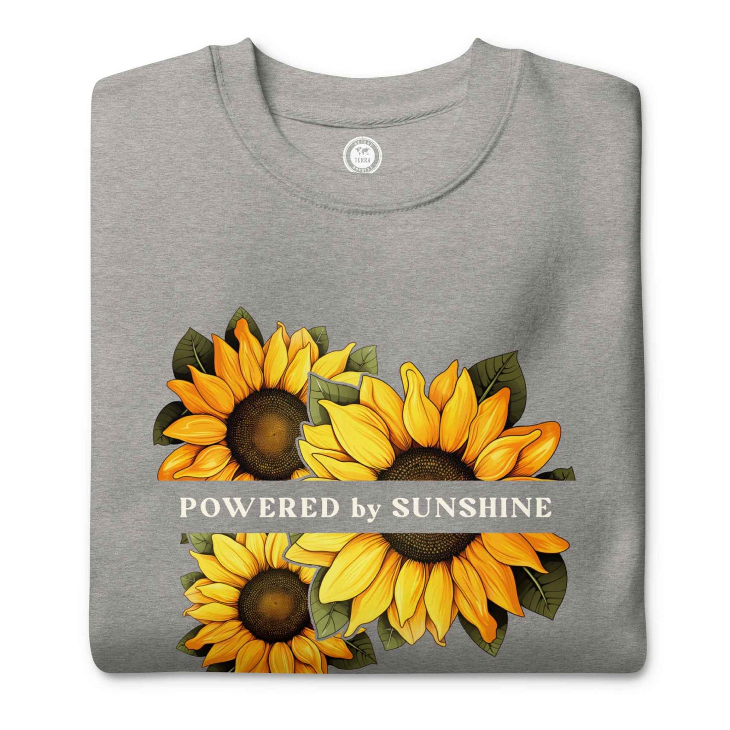 Woman sweatshirt with sunflower design and text Powered by Sunshine.