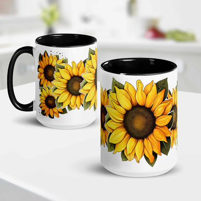 White and black ceramic mug 15 oz with sunflower designs on a white surface and kitchen background 