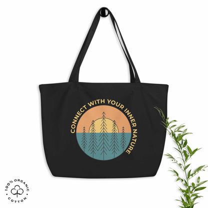 Black organic cotton tote bag with nature-themed design featuring sun and trees and 'Connect with Your Inner Nature' text on a white background.