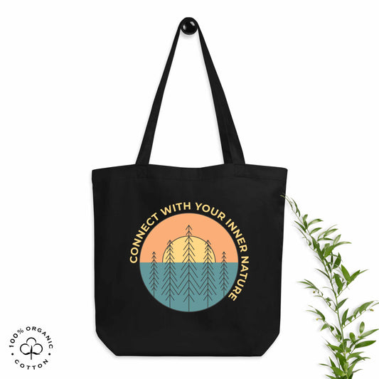 Black organic cotton medium tote bag with nature-themed design featuring sun and trees and 'Connect with Your Inner Nature' text on a white background.