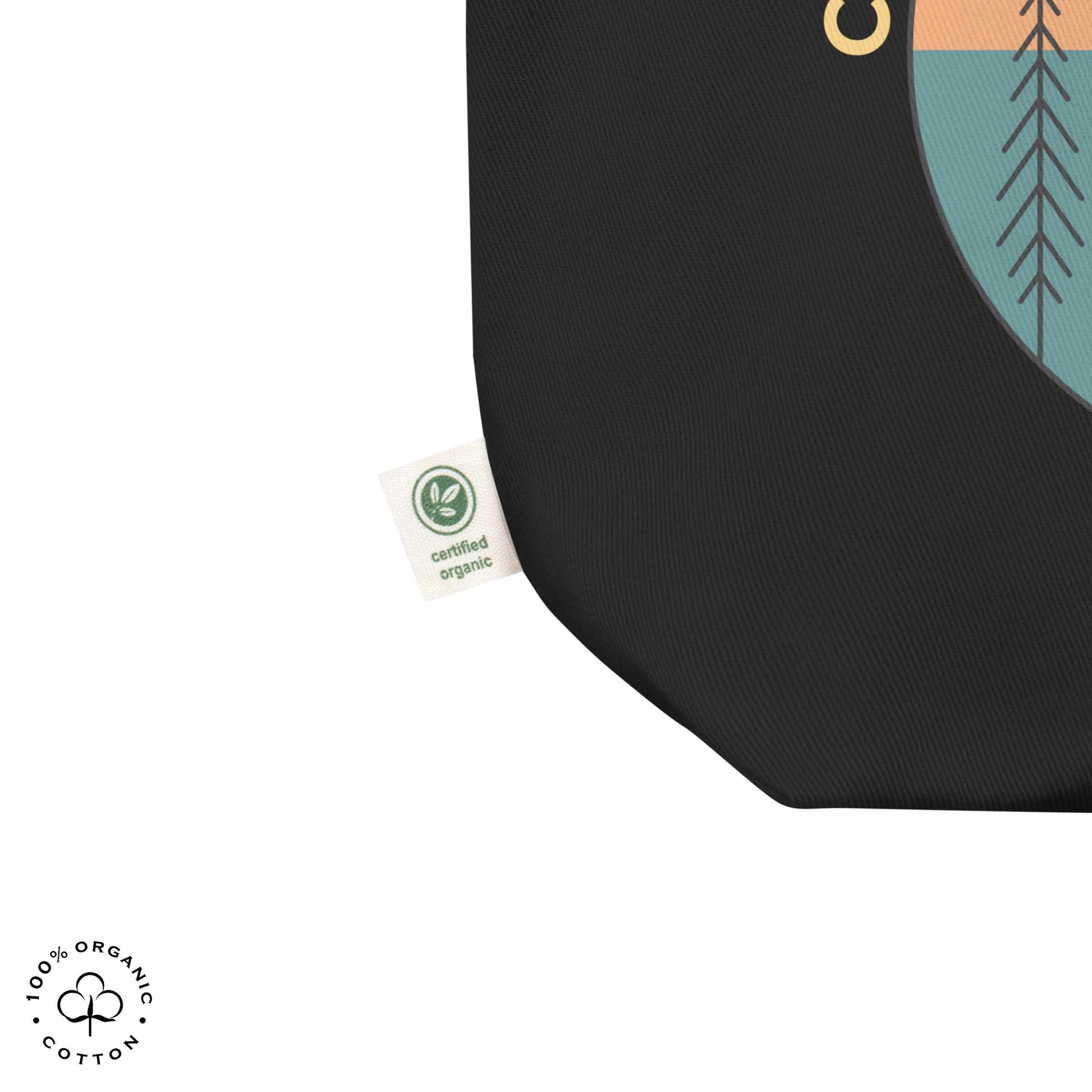 Close-up black organic cotton medium tote bag with nature-themed design featuring sun and trees and 'Connect with Your Inner Nature' text on a white background.