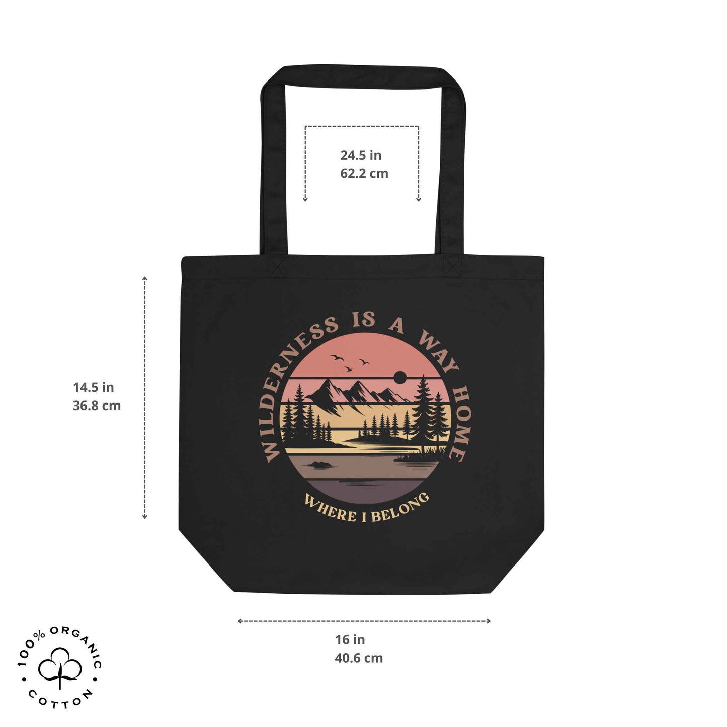 Black organic cotton medium tote bag with nature-themed design: forest, trees, sun, lake. 'Wilderness is a Way Home, Where I belong' text. 