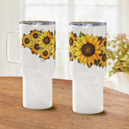 Two white tumblers travel mug insulated 25 oz with sunflower designs on a wooden surface.